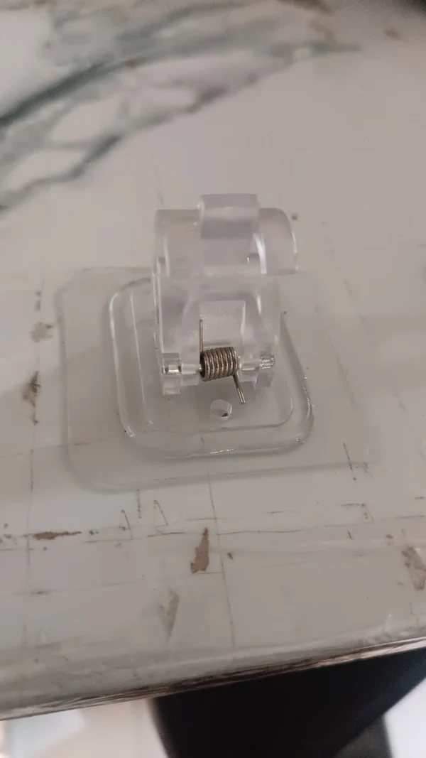 Transparent Self Adhesive Wall Clip with Strong Spring Grip